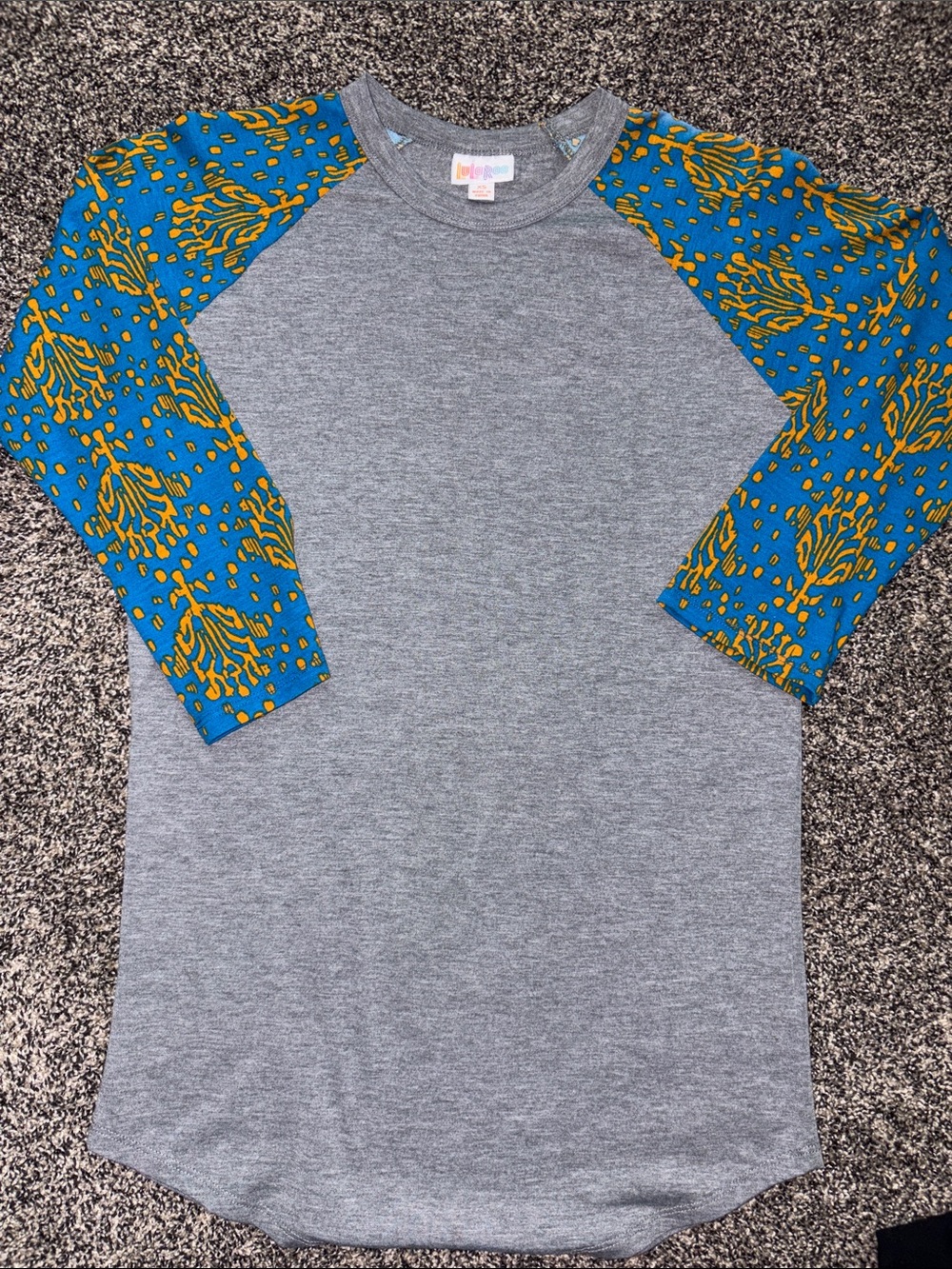 LuLaRoe Grey Tee with Teal & Mustard Printed Raglan Sleeves